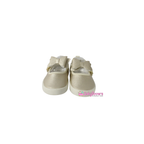 zapatos con moño dorados